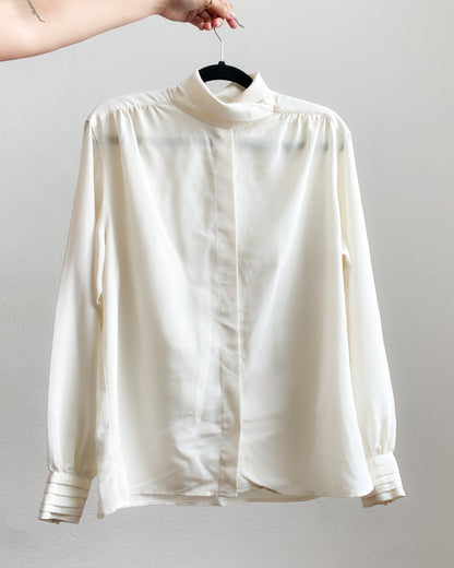 Blusa crema